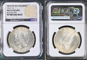 U.S Mint 1923 Silver Peace Dollar with Original Bag Fragment NGC BU